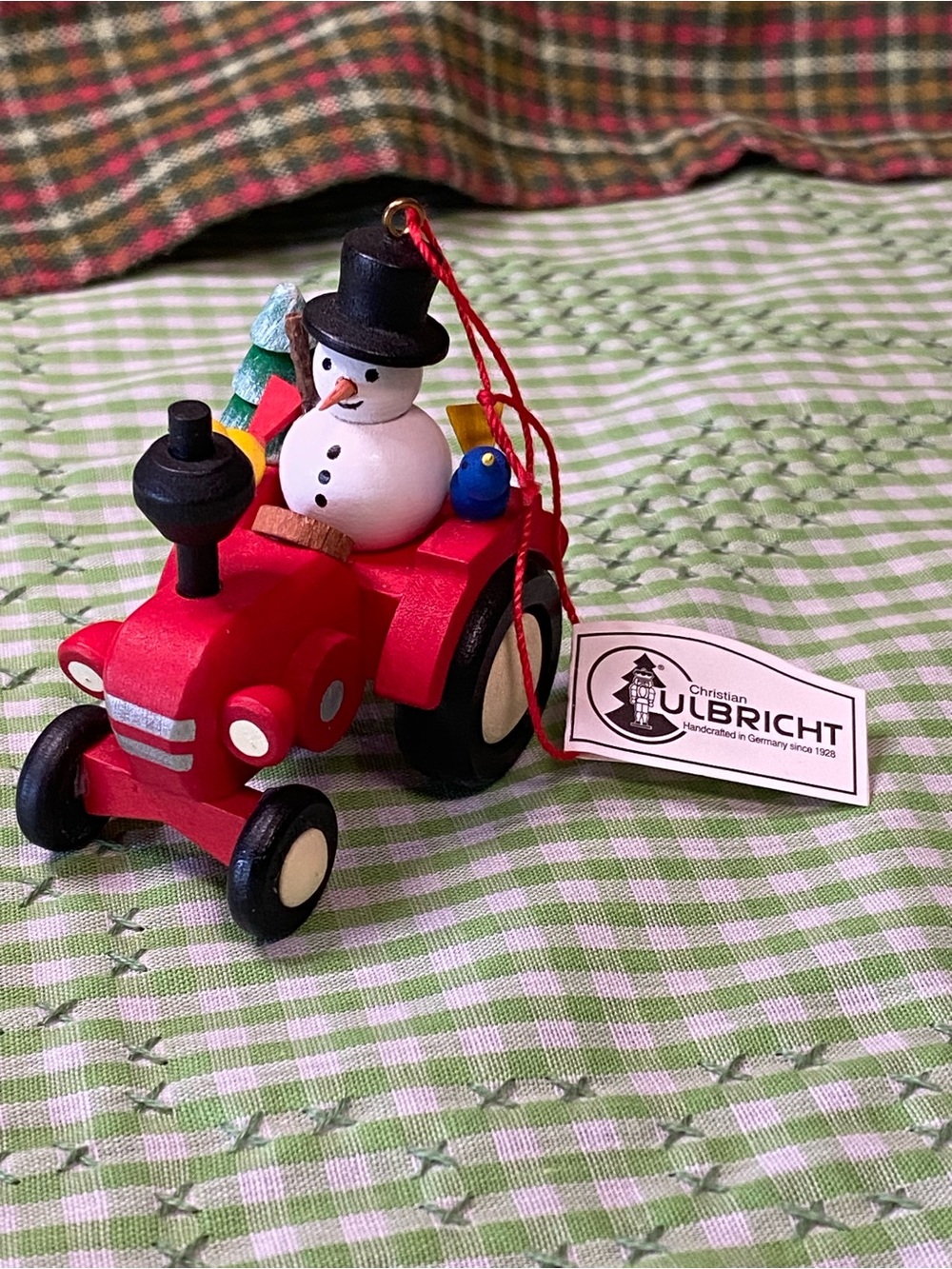 Ulbricht Red Wooden Tractor Ornament with Snowman and Tree (VO)